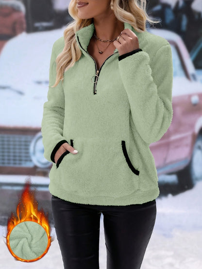 Fleece pullover for women with half-zip and practical pockets Chic and Style