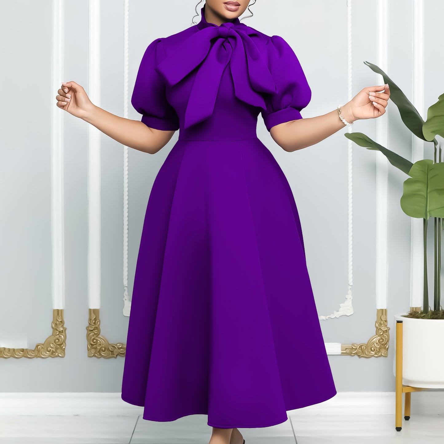 Robe midi femme avec un élégant noeud et des manches bouffantes Chic und Stil