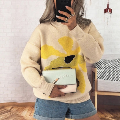 Pull femme avec motif floral saisissant et coupe décontractée Chic und Stil