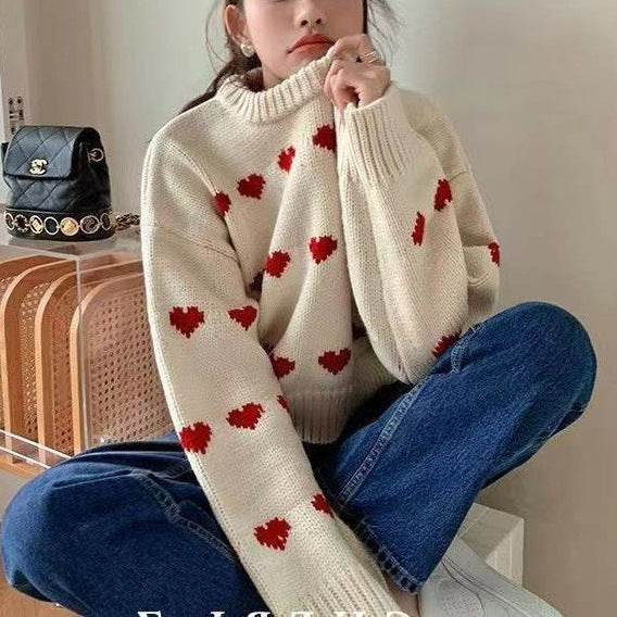 Pull femme avec motif en cœur et coupe décontractée Chic und Stil