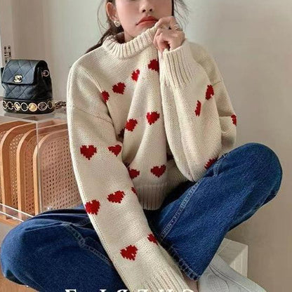 Pull femme avec motif en cœur et coupe décontractée Chic und Stil