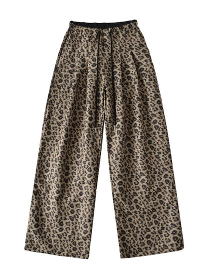 Trendy leopard wide-leg pants for women with elastic waistband and tie belt Chic and Style