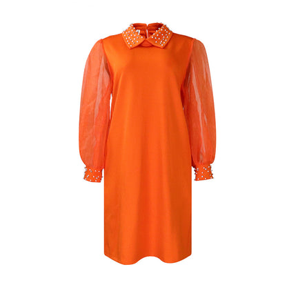 Robe pour femmes avec manches transparentes et ornements en perles Chic und Stil
