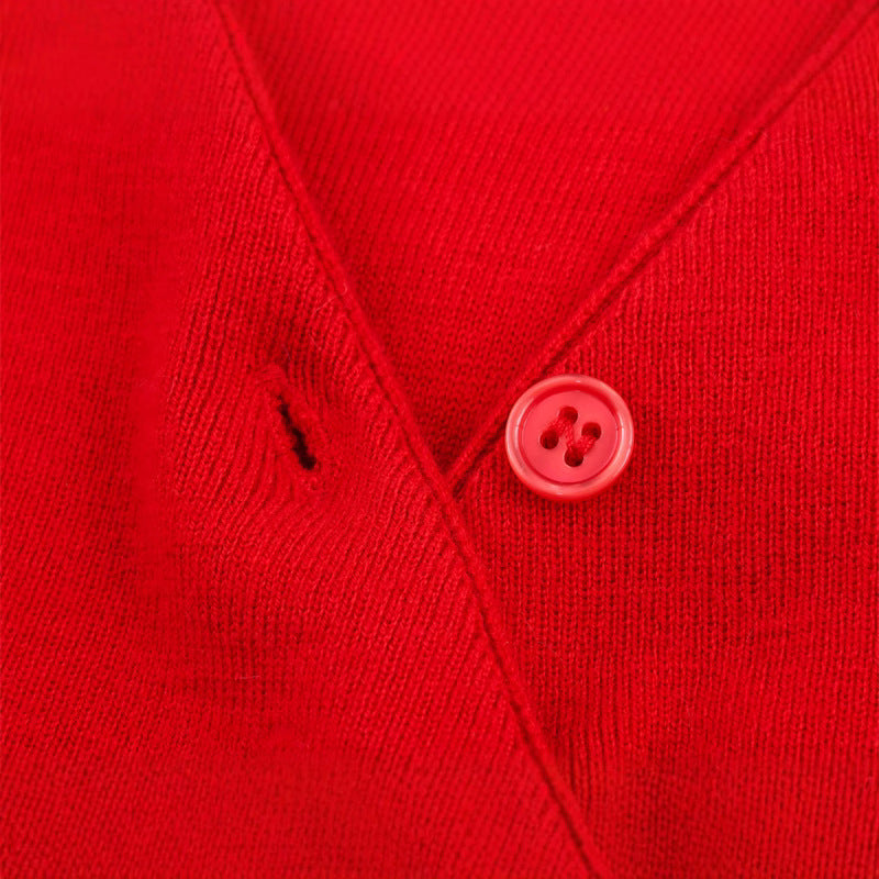 Pull en tricot court pour femmes avec détail de bouton et décolleté en V Chic und Stil