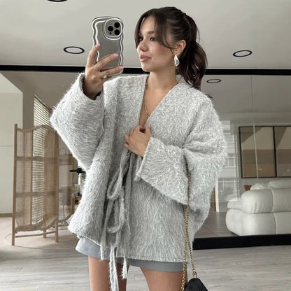 Ladies soft pullover with trendy knot belt Chic and Style