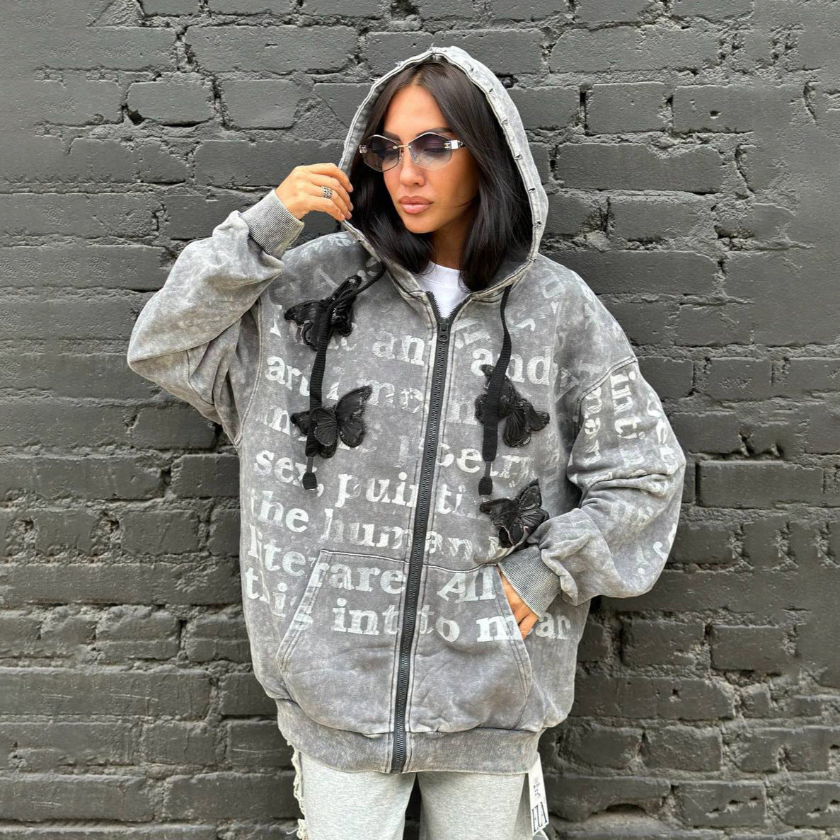 Dame Hoodie surdimensionné avec écriture et broderies Chic und Stil