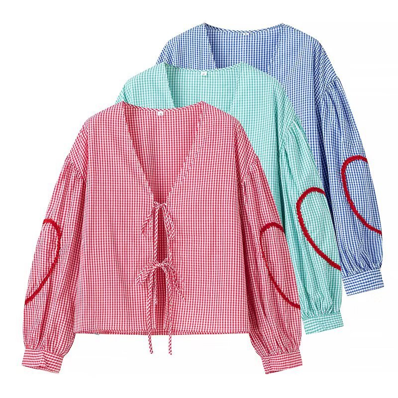 Chemisier pour femmes avec des manches volumineuses et un design à carreaux moderne Chic und Stil