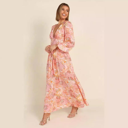 Robe d'été à motifs floraux pour femmes avec décolleté en V profond et manches bouffantes Chic und Stil