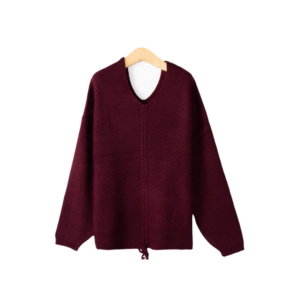Pull femme en tricot épais avec un décolleté en V attrayant et des détails pratiques en cordon Chic und Stil