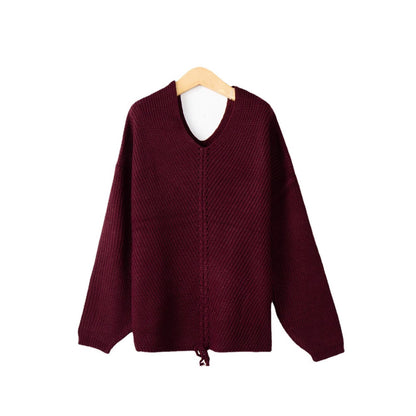 Pull femme en tricot épais avec un décolleté en V attrayant et des détails pratiques en cordon Chic und Stil