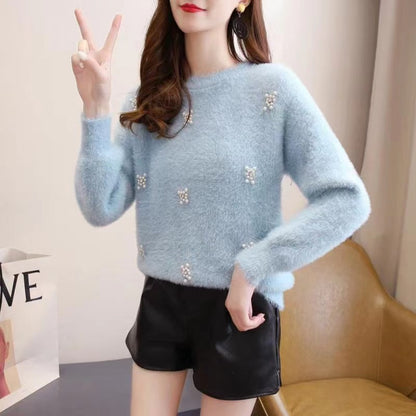 Femmes pull doux avec élégantes appliqués en perles Chic und Stil