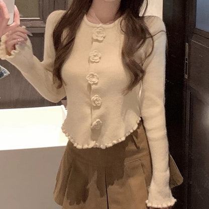 Dames élégante cardigan avec des détails de boutons floraux Chic und Stil