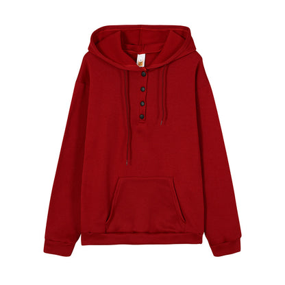 Pull à capuche pour femmes avec détails en bouton et poche kangourou pratique Chic und Stil