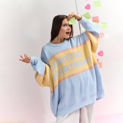 Dame Pull oversized avec inscription créative Chic und Stil