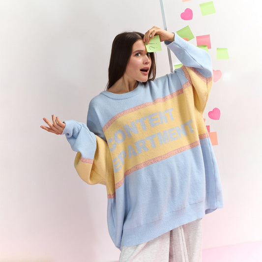 Dame Pull oversized avec inscription créative Chic und Stil