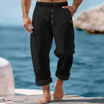 Men's casual beach shorts with elastic waistband and practical button details Chic and Style
