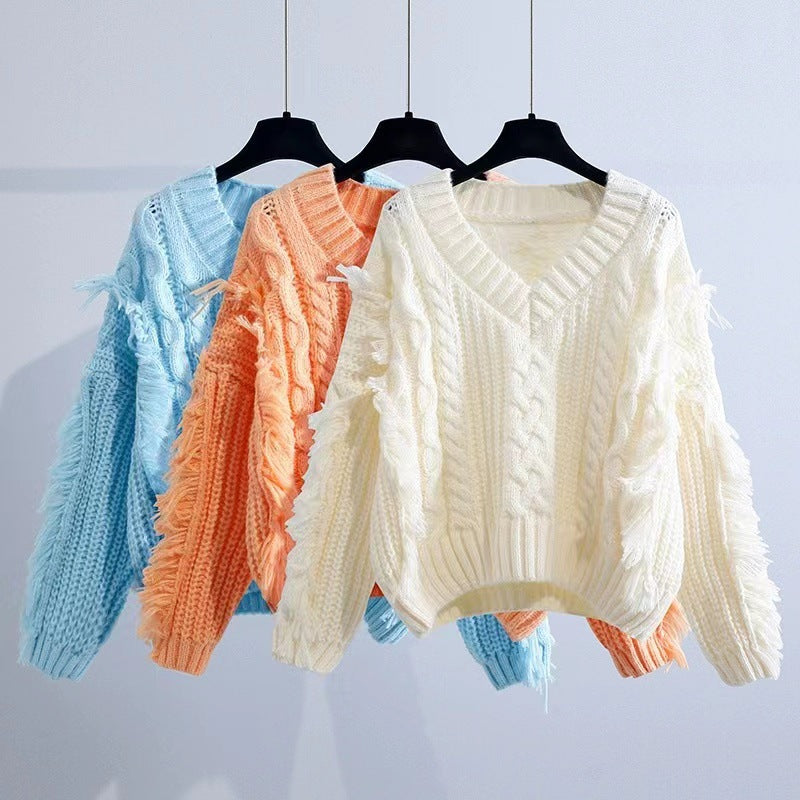 Pullover en tricot pour femmes avec des franges accrocheuses et un motif de torsades Chic und Stil