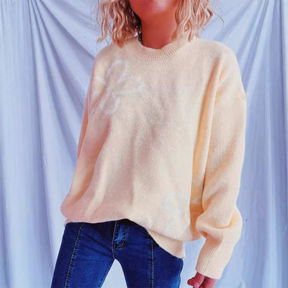 Pull en tricot pour femmes avec des accents floraux et une coupe décontractée Chic und Stil