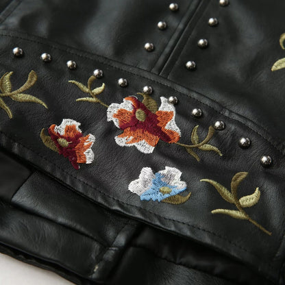 Biker jacket in faux leather for women with embroidered floral design and stud embellishments Chic and Style