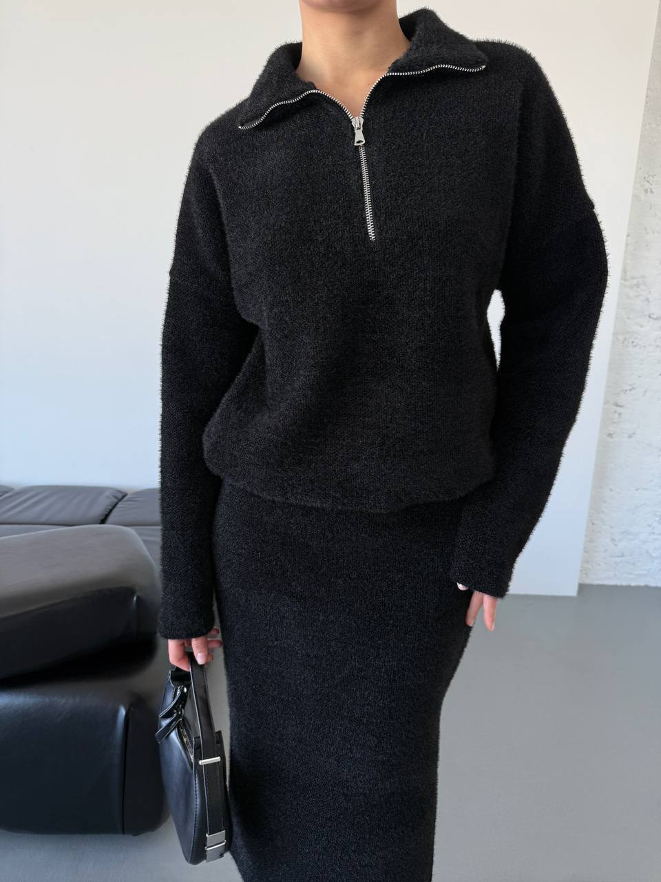 Femme pull en tricot à la mode avec fermeture éclair courte Chic und Stil