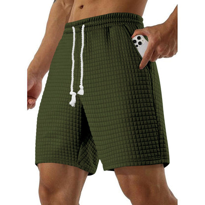 Shorts de sport pour hommes en material respirant avec poches latérales pratiques Chic und Stil