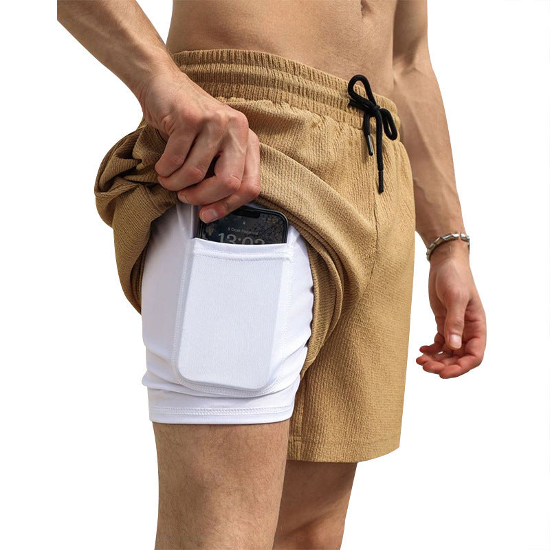 Shorts de sport pour hommes avec poche pratique pour smartphone Chic und Stil