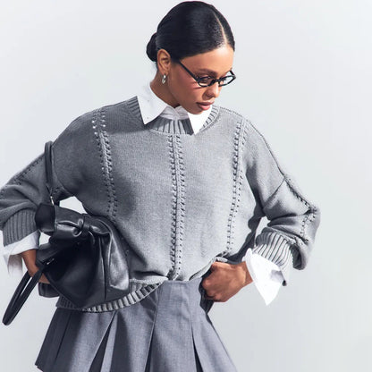Pull en tricot surdimensionné pour femmes avec une structure aérienne et des détails particuliers Chic und Stil