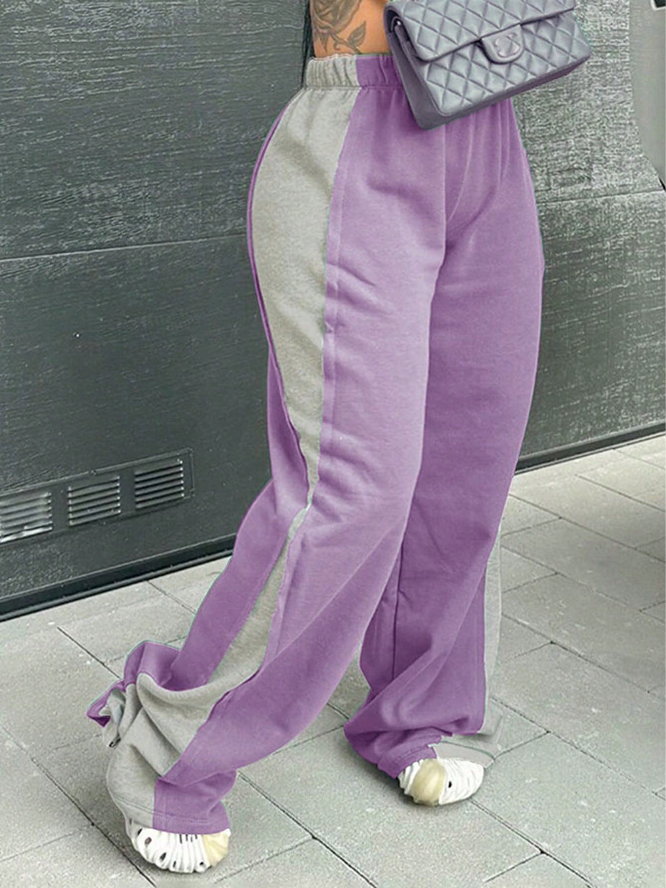 Casual women's sports pants with colorful side inserts and an elastic waistband Chic and Style