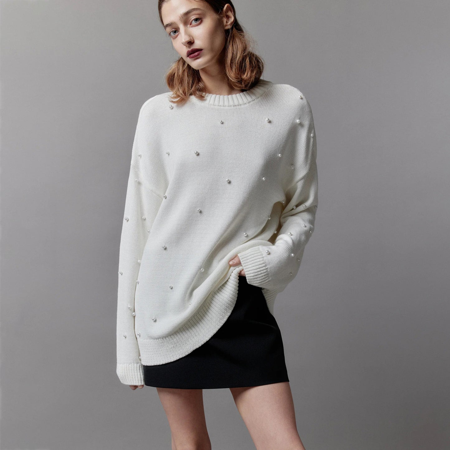 Pull en grosse maille pour femmes avec encolure perlée Chic und Stil