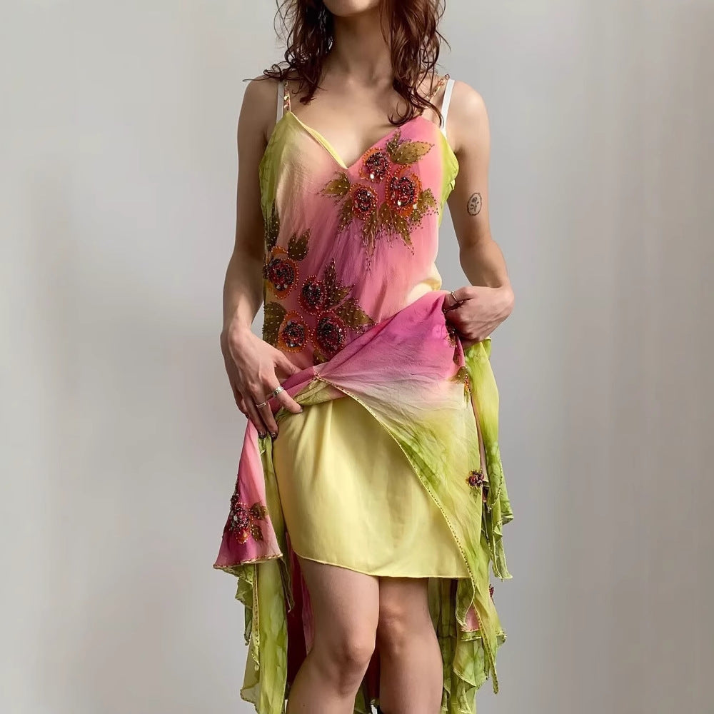 Robe d'été asymétrique pour femmes avec un design floral et de délicates bretelles spaghetti Chic und Stil