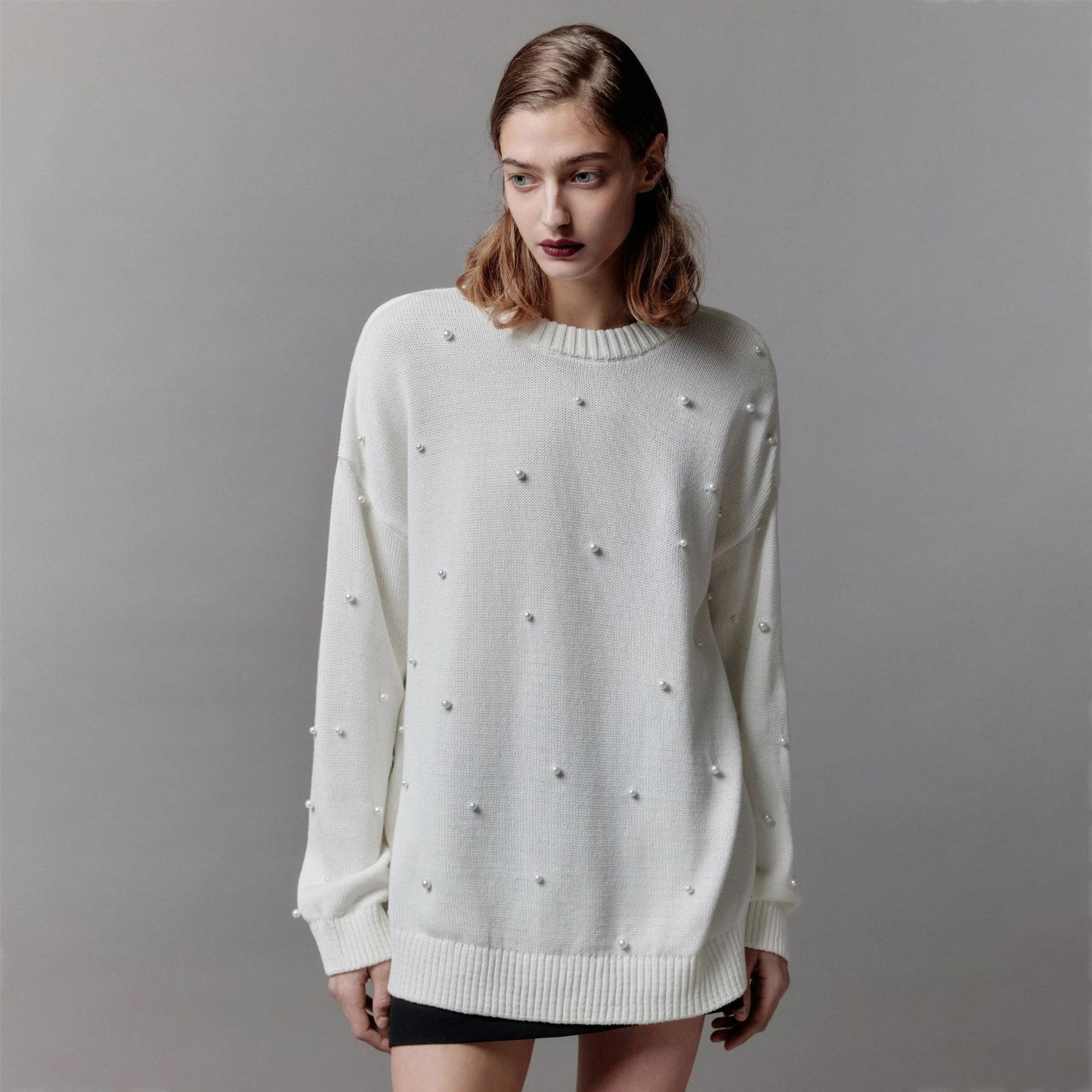 Pull en grosse maille pour femmes avec encolure perlée Chic und Stil