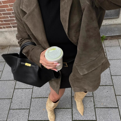 Blazer chic pour femmes en matériau doux avec poches pratiques Chic und Stil