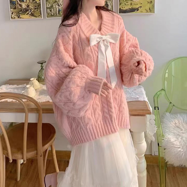 Dames Grand pull en tricot avec détail en noeud et motif en torsades Chic und Stil