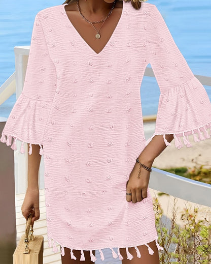 Robe de plage pour femmes avec un élégant décolleté en V et des franges décoratives Chic und Stil