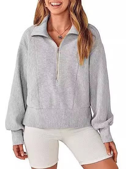 Pull sportif pour femmes avec col montant et demi-zip Chic und Stil
