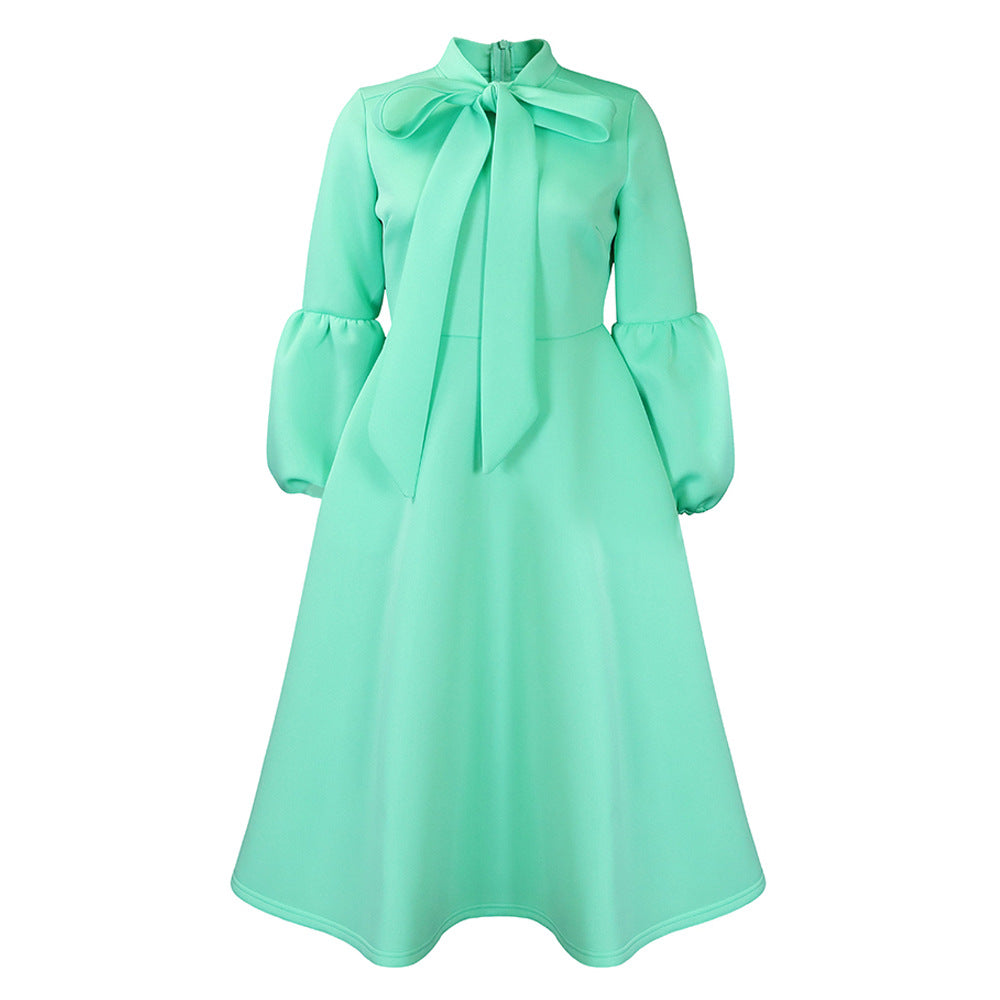 Robe midi pour dames avec col à nouer et manches volumineuses Chic und Stil