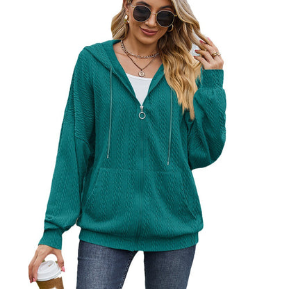 Dames Pull à capuche surdimensionné avec motif texturé et poches pratiques Chic und Stil