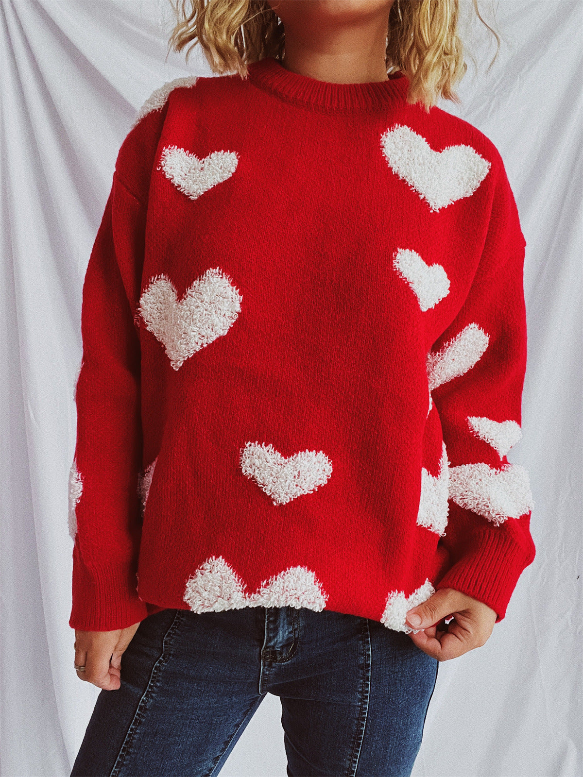Pull femme avec motif en cœur et applications moelleuses Chic und Stil