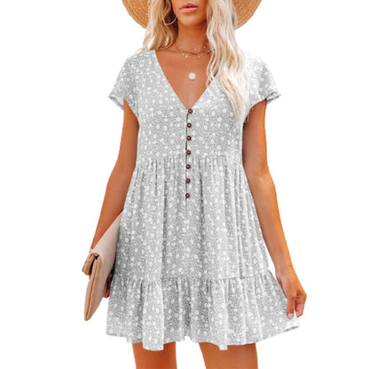 Robe d'été pour femmes avec des motifs floraux et des détails de boutons Chic und Stil