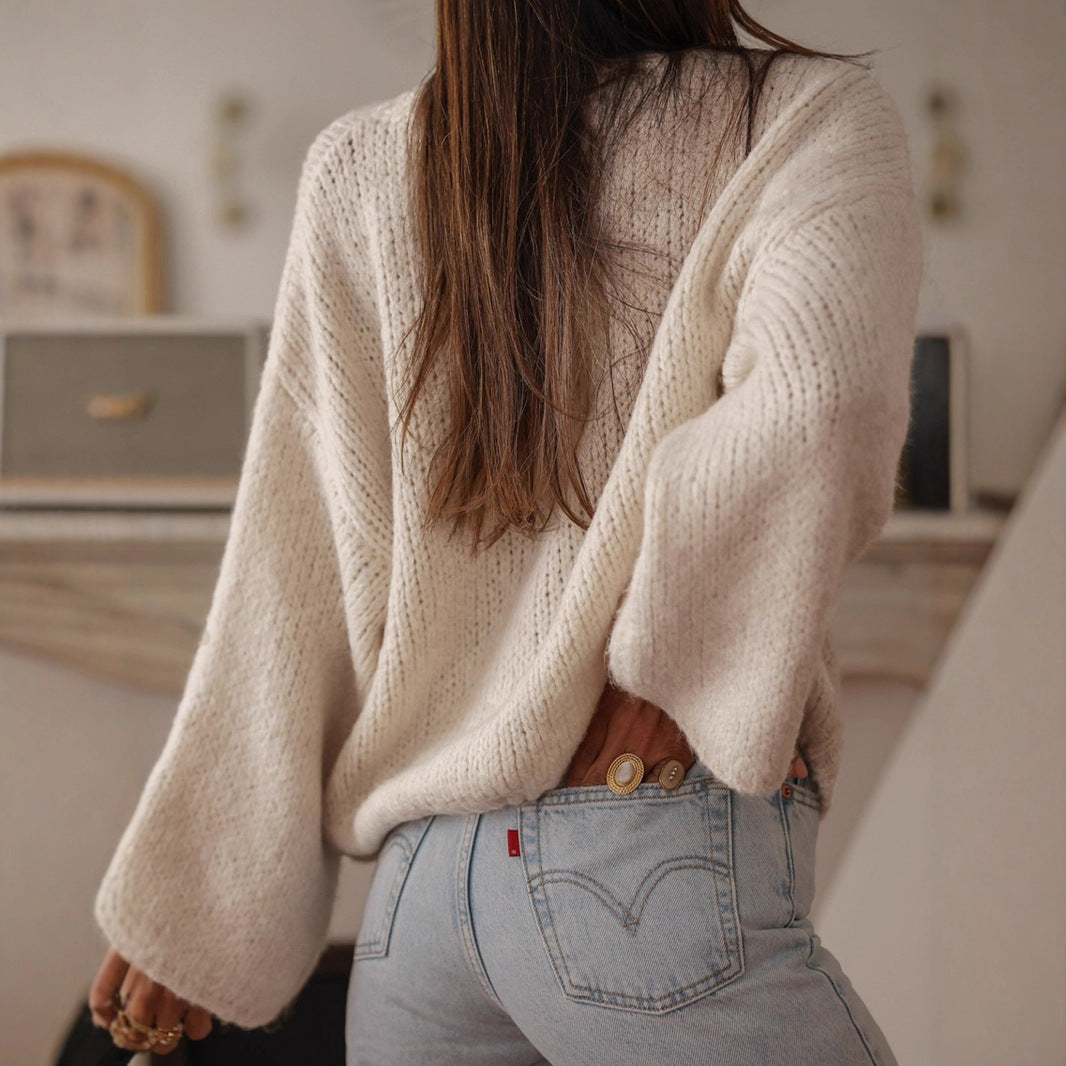 Dames pull-over confortable avec des manches surdimensionnées et de élégants boutons en perles Chic und Stil