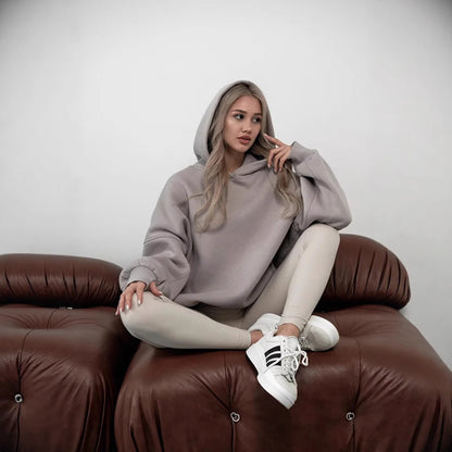 Pull à capuche oversized pour femmes avec une coupe ample et des poches pratiques Chic und Stil