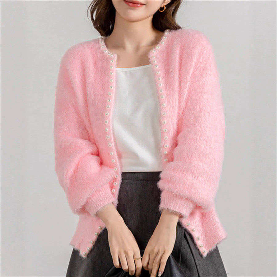 Ladies cozy pullover with pearl embellishment Chic and Style