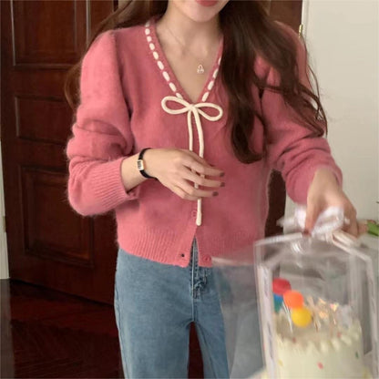 Ladies soft pullover with contrasting buttons and elegant details Chic and Style