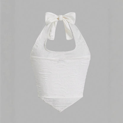 Haut de maillot de bain pour femme à encolure halter avec un détail de nœud ludique et un tissu texturé Chic und Stil