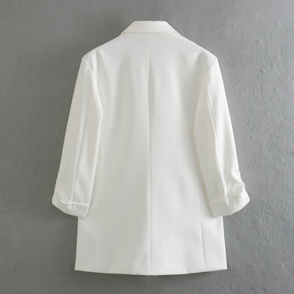 Elegant blazer jacket for women with structured sleeves and discreet golden accents Chic and Style