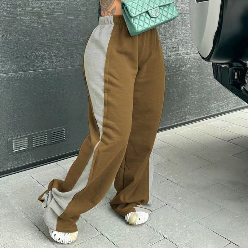Casual women's sports pants with colorful side inserts and an elastic waistband Chic and Style