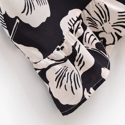 Robe maxi pour femmes avec broderie florale et volants élégants Chic und Stil