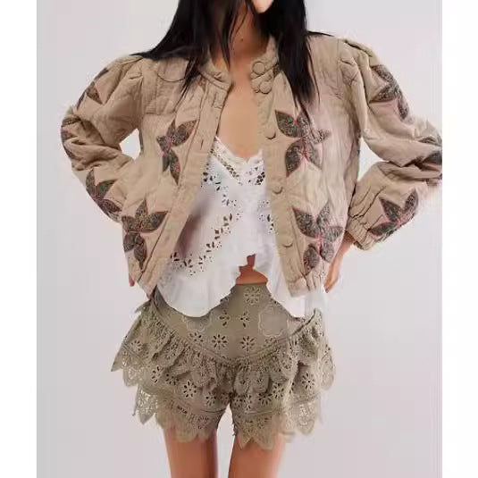 Dames blouson matelassé avec design floral et bords élastiques Chic und Stil