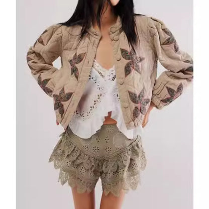 Dames blouson matelassé avec design floral et bords élastiques Chic und Stil