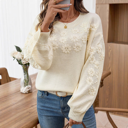 Pull femme à la mode avec broderies florales et manches structurées Chic und Stil